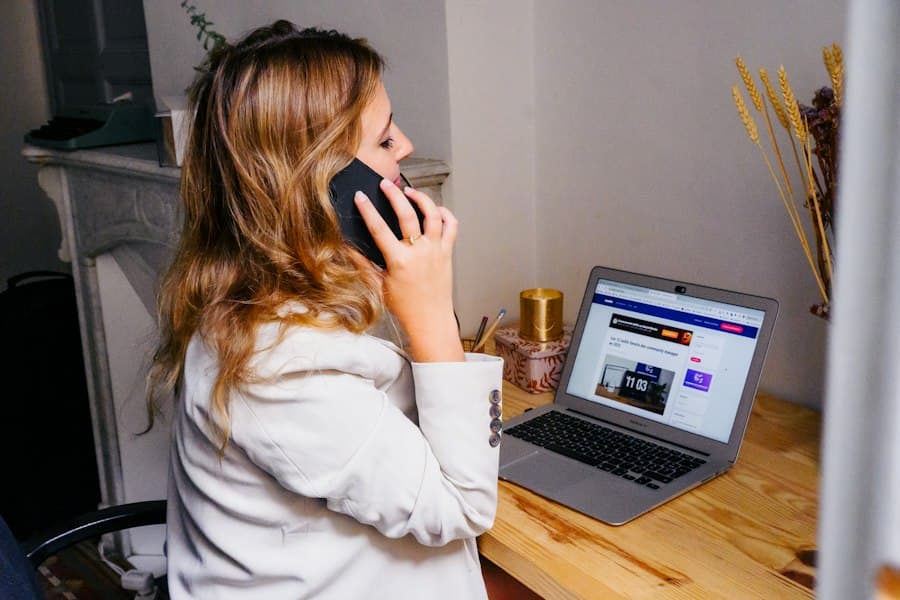 Person on a phone call at a laptop